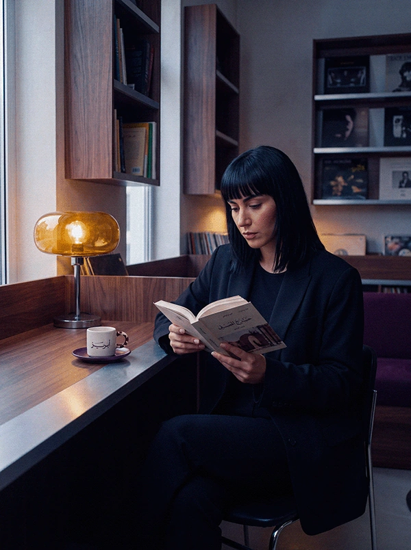 ABREEZ seated reading portrait